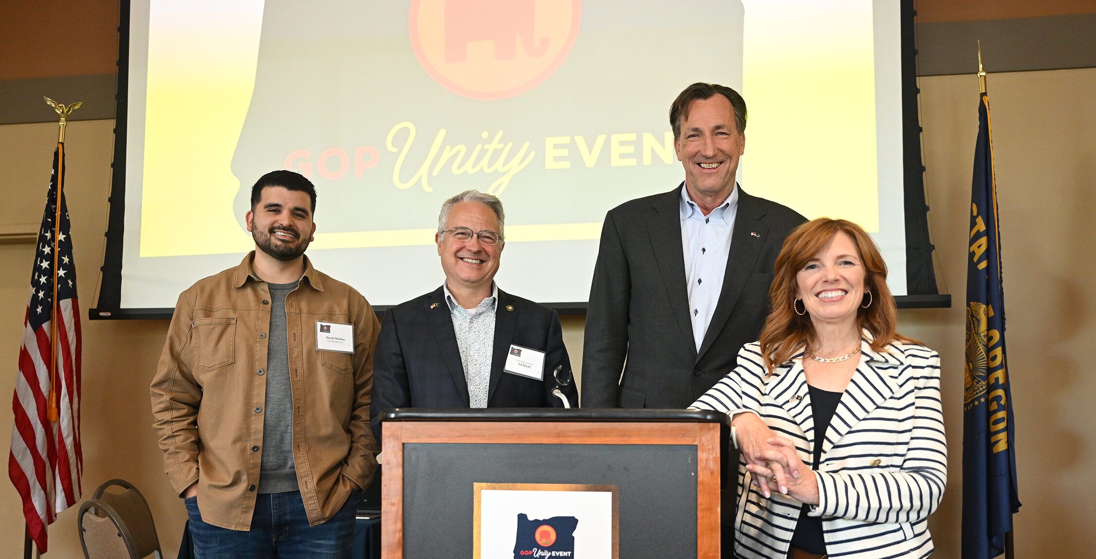 Republican gubernatorial nominee Christine Drazan joins David Medina, David Brock Smith, Ed Diehl, and Chris Dudley at the Oregon Republican Party's GOP Unity Luncheon in Salem on May 27, 2026.
